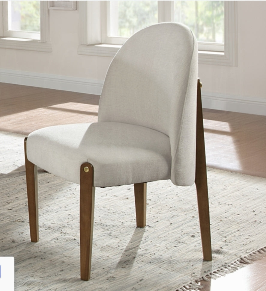 Lisbeth Upholstered Dining chair finished in walnut