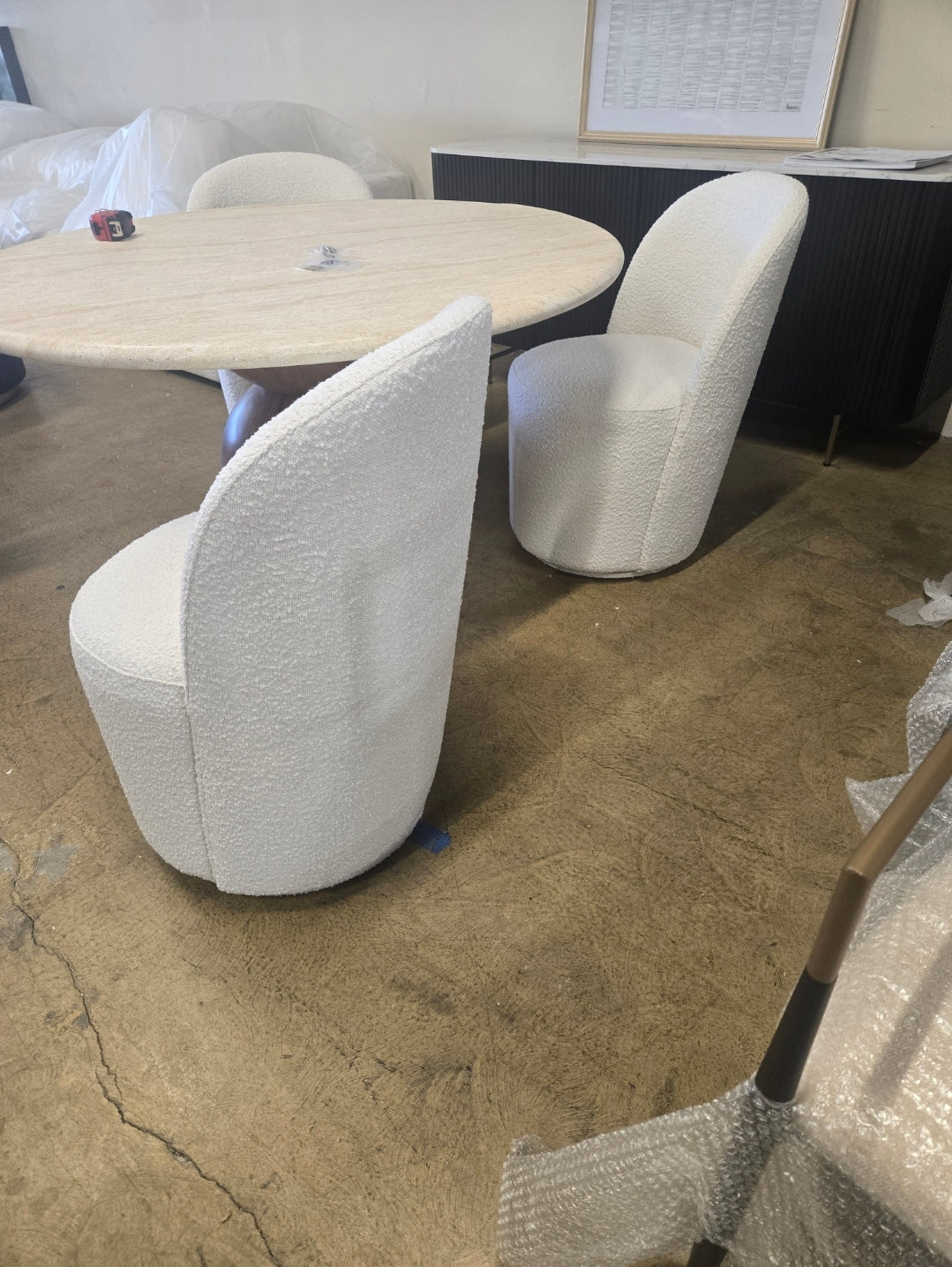 Tete Upholstered Swivel dining chair in ivory performance boucle fabric