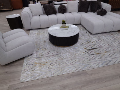 Channel tufted Right facing sectional upholstered in white fabric waccent pillows