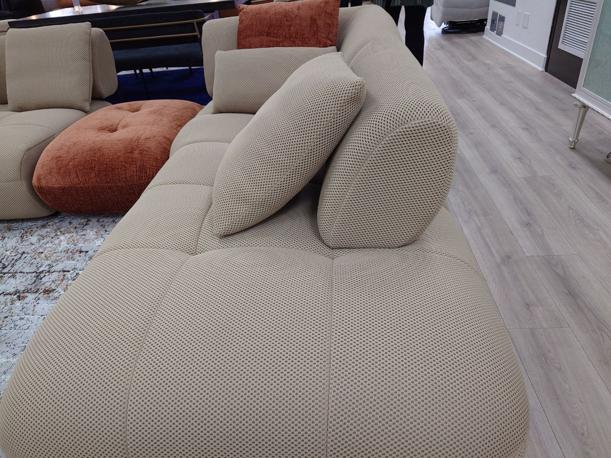 Gorgeous tufted Right facing sectional upholstered in soft beige performance mesh fabric