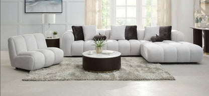 Channel tufted Right facing sectional upholstered in white fabric waccent pillows