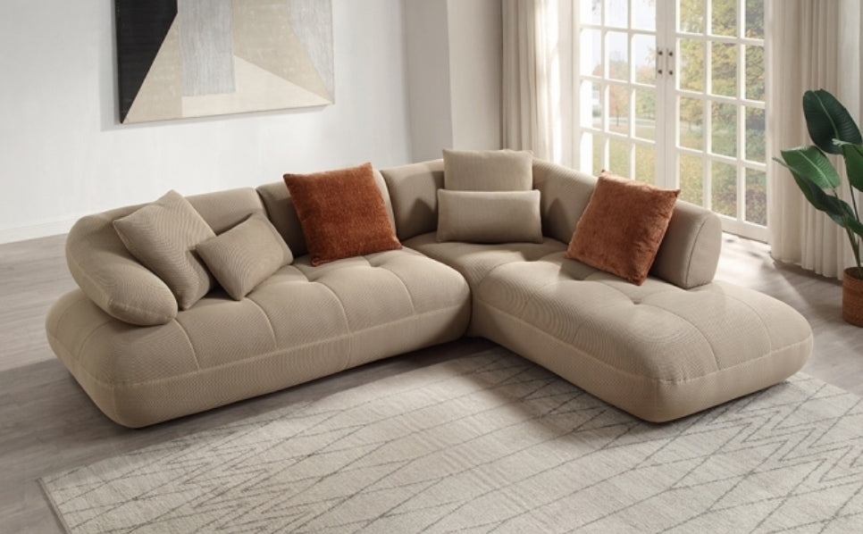 Gorgeous tufted Right facing sectional upholstered in soft beige performance mesh fabric