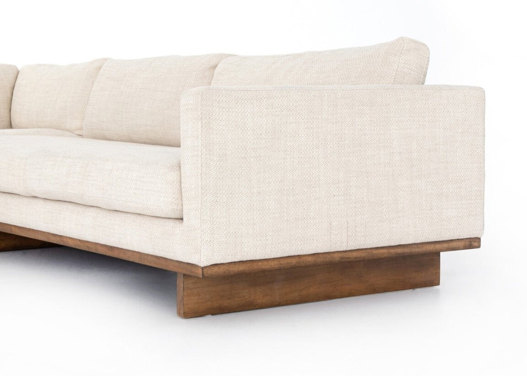 Judith sectional with solid wood platform